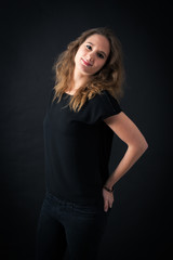 Beautiful woman doing different expressions in different sets of clothes: posing