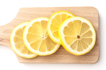 Sliced lemons on cutting board