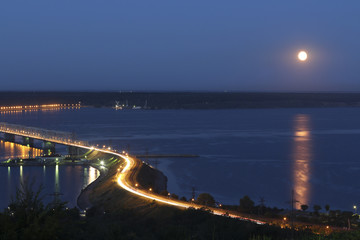 Bridge over the river Volga at night with moonlight