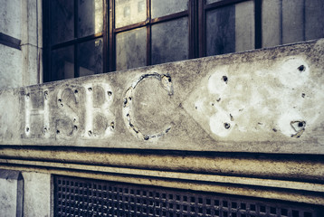 Old weathered stone where a nameplate has been removed (HSBC Bank) - 89659047