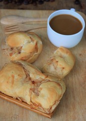 tasty coconut bread and hot coffee