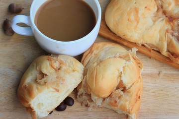 tasty coconut bread and hot coffee