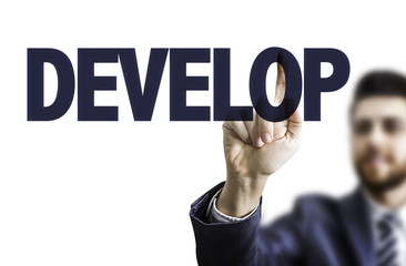 Business man pointing the text: Develop
