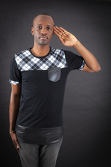 Handsome man doing different expressions in different sets of clothes: at attention