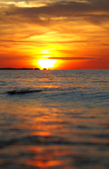 Naklejka na ściany i meble sunset on the sea.