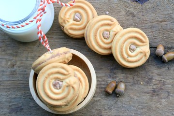tasty cream cookies and milk