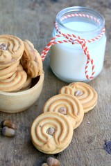tasty cream cookies and milk