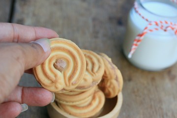 tasty cream cookies and milk