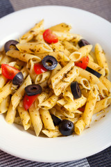 Penne with cherry tomatos and black olives