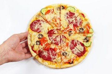 Hand man takes a piece of flavored pizza on a white background