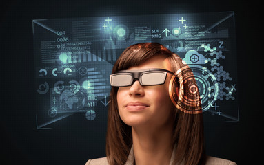 Young woman looking with futuristic smart high tech glasses