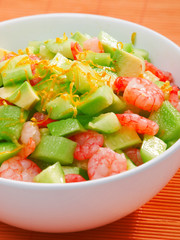 Shrimps salad with avocado and cucumbers