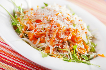 Fresh salad with carrots and cheese