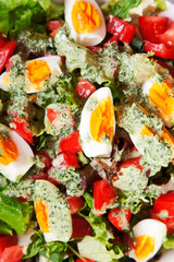 Summer salad with tomatos and boiled eggs