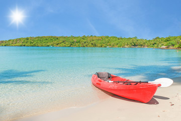 Summer, Travel, Vacation and Holiday concept - Red kayaks on the