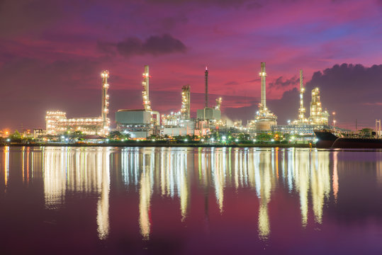 Petrochemical plant ( oil refinery ) industry at twilight time.