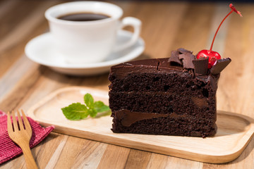 chocolate cake with a coffee cup