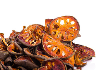 dried quince slices on a white background
