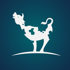 Vector image of an cow design on blue background