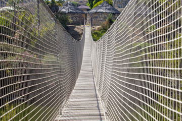 Rope and net suspension bridge