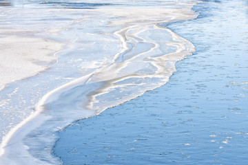 Blue ice formed on the Bow River in Calgary Canada.