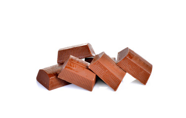 chocolate pieces on white background