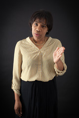 Beautiful woman doing different expressions in different sets of clothes: be careful