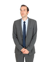 Handsome businessman doing different expressions in different sets of clothes: bored