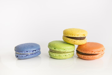 Macarons on white background.