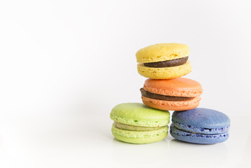 Macarons on white background.