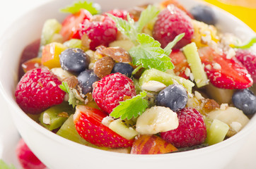 Salad with fresh fruits. Healthy breakfast.