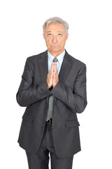 Handsome man doing different expressions in different sets of clothes: praying