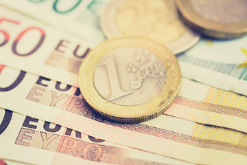 Money, close up of Euro currency (EUR) banknotes and coins