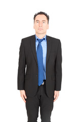 Handsome businessman doing different expressions in different sets of clothes: at attention