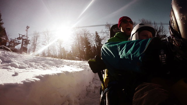 4K grunge styled Video: Father and son enjoying bobsleigh attraction