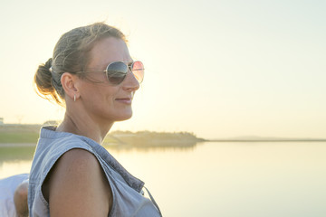 middle-aged woman in sunglasses