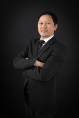 handsome man doing different expressions in different sets of clothes: arms crossed