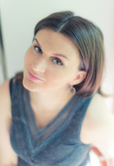 Portrait of an attractive fashionable young brunette woman