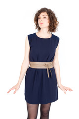 Beautiful Hispanic woman doing different expressions in different sets of clothes: innocence