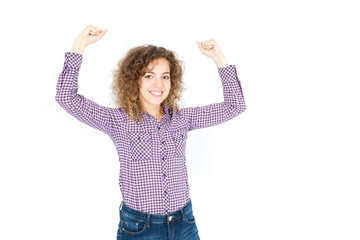 Obraz premium Beautiful Hispanic woman doing different expressions in different sets of clothes: arms raised