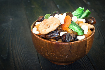 dried fruits in a wooden bowl