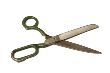 Old large pair of scissors on a white background
