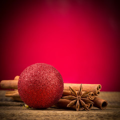 Close up of cinnamon sticks and star anise on wood