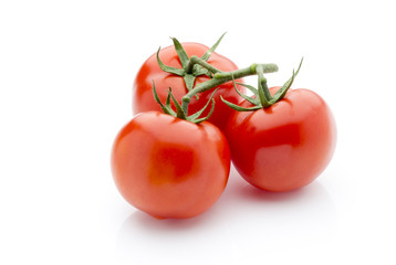 Tomato on the white isolatd background.