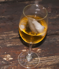 Glass of wine on a wooden table