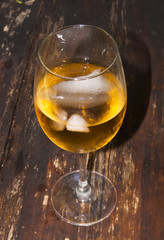 Glass of wine on a wooden table