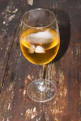 Glass of wine on a wooden table