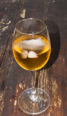 Glass of wine on a wooden table
