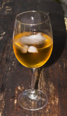 Glass of wine on a wooden table