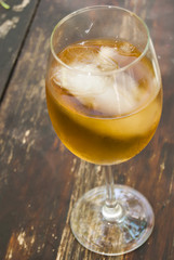 Glass of wine on a wooden table
